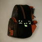 Loungefly Trick or Treat Mini Backpack Halloween Trick 'r Treat Bag Glow In The Dark Left Side