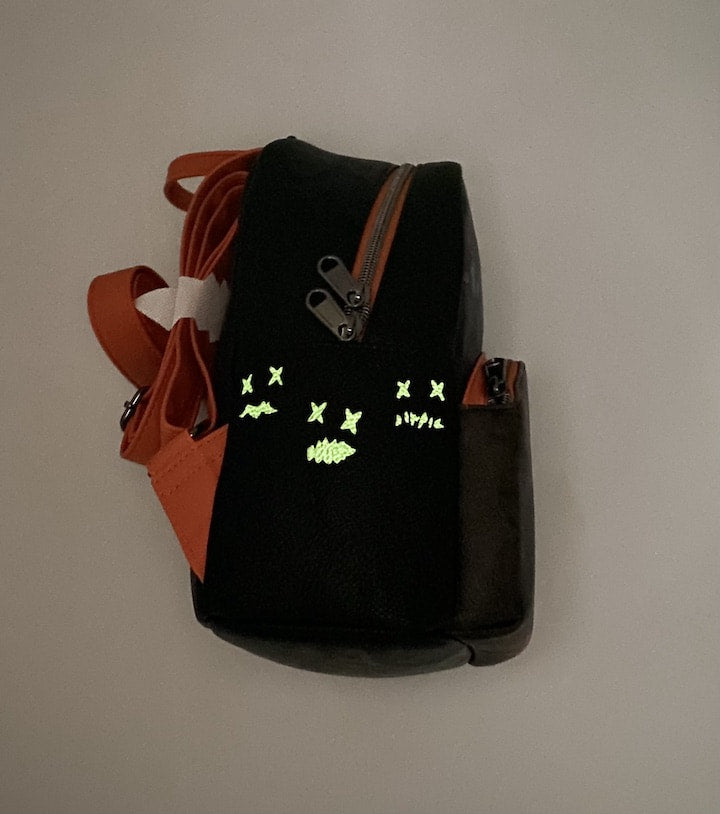 Loungefly Trick or Treat Mini Backpack Halloween Trick 'r Treat Bag Glow In The Dark Right Side