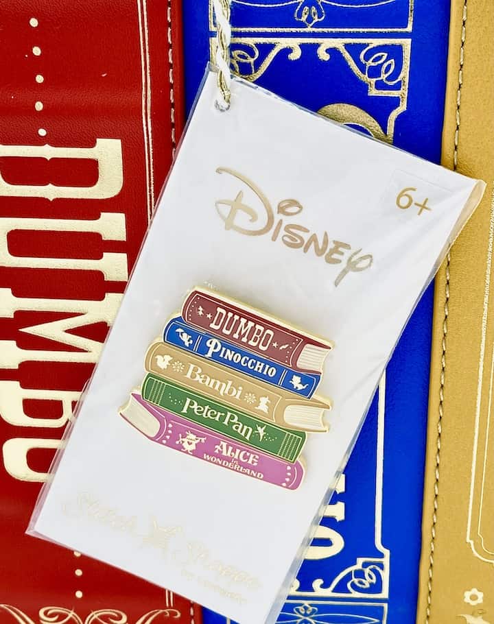 Loungefly Stitch Shoppe Disney Books Volume 4 Crossbody Bag Pin Front